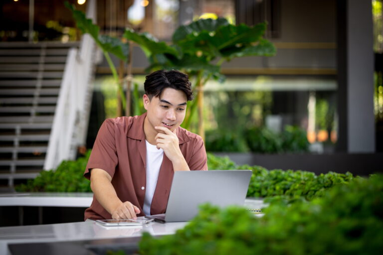 a student studying on an outdoor setting