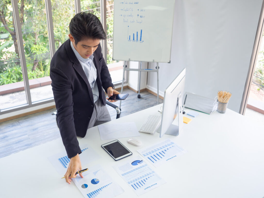 a financial expert looking at different graphs