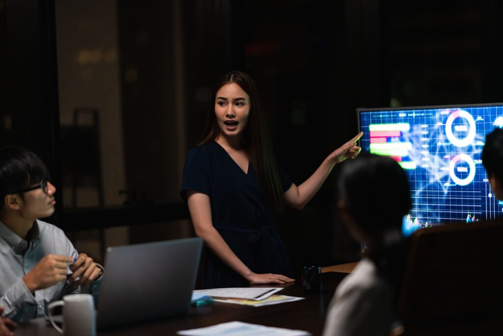 Businessmen in a meeting conducting a presentation