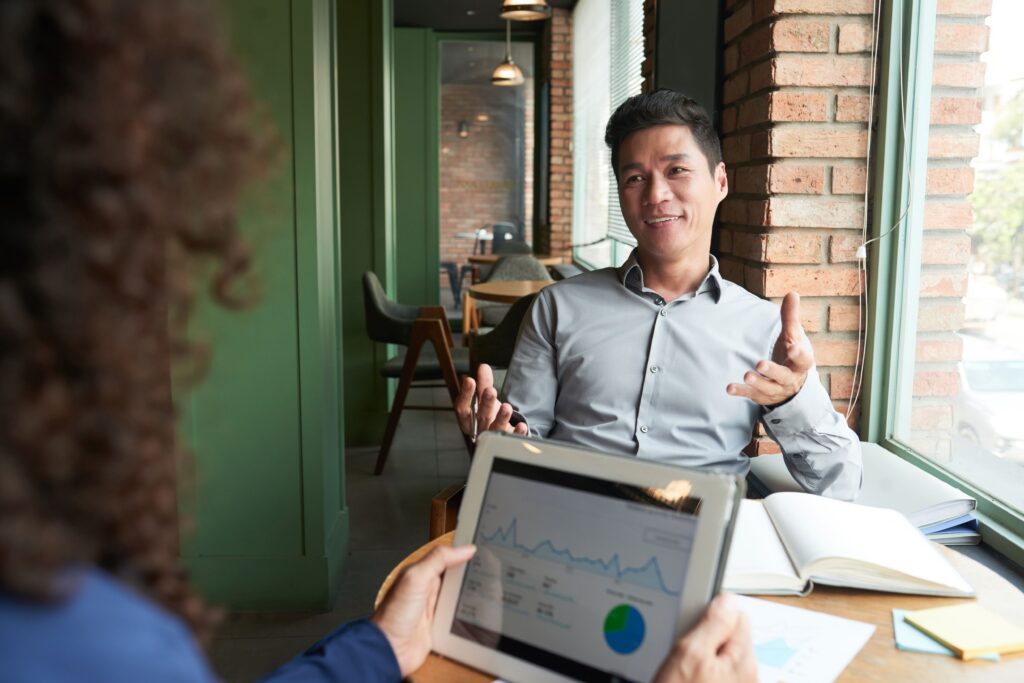 Man on a business meeting with data
