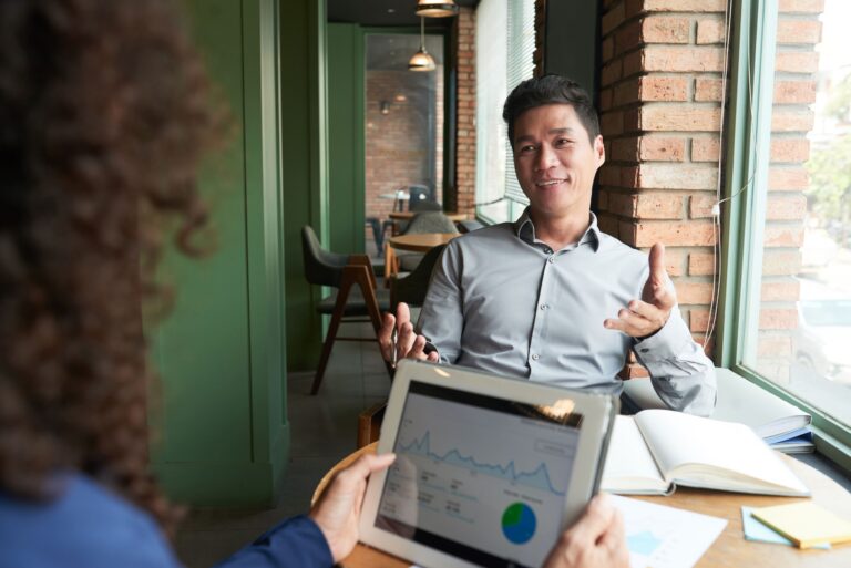 Man on a business meeting with data