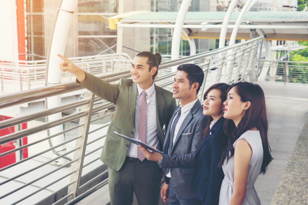 Colleagues working together outside the office