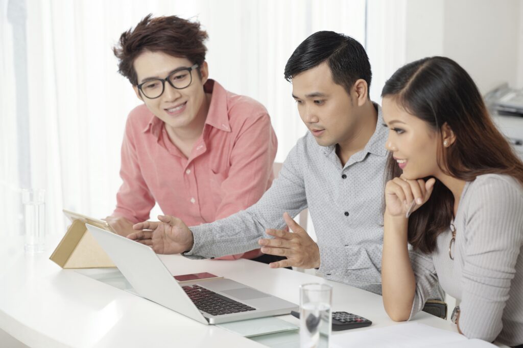 Portrait young man and woman at office